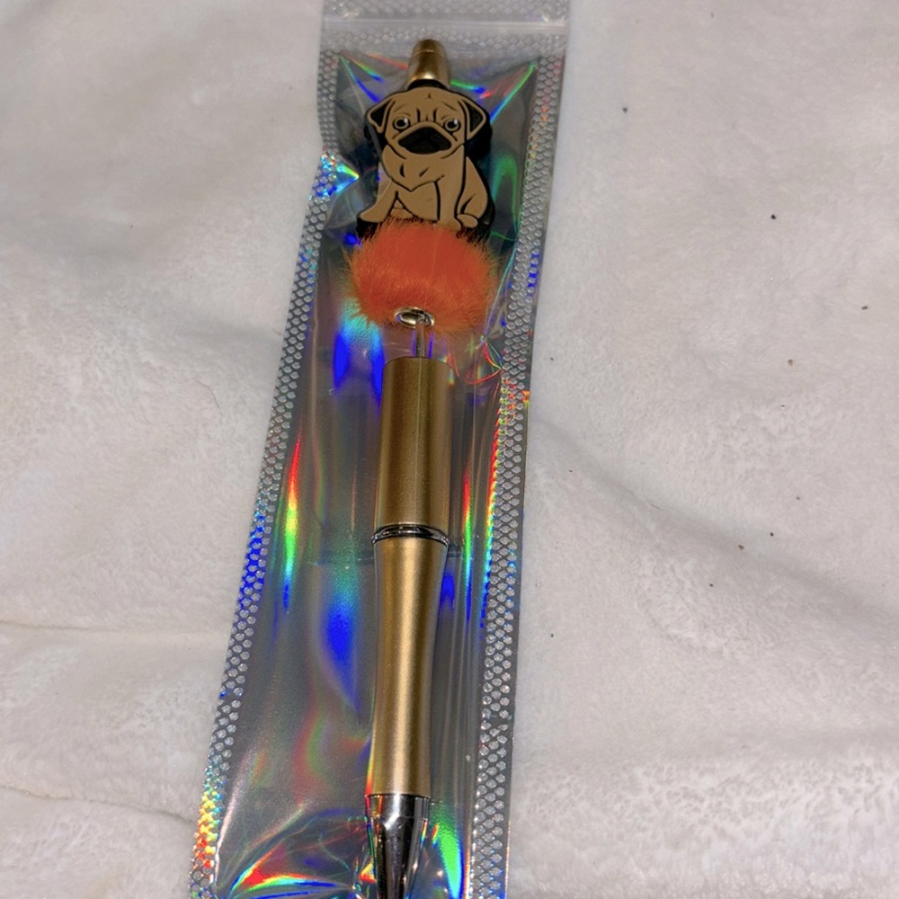 New handmade pug dog 🐕 ink 🖊️ pen with orange fur bead made by grandson age 4